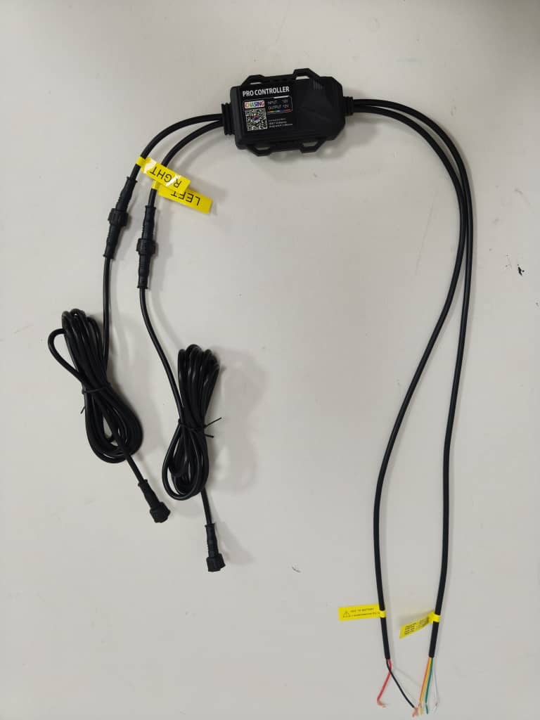 RGB module harness by Lucky Whips showing a black connector with colorful wiring for customizable lighting installations.