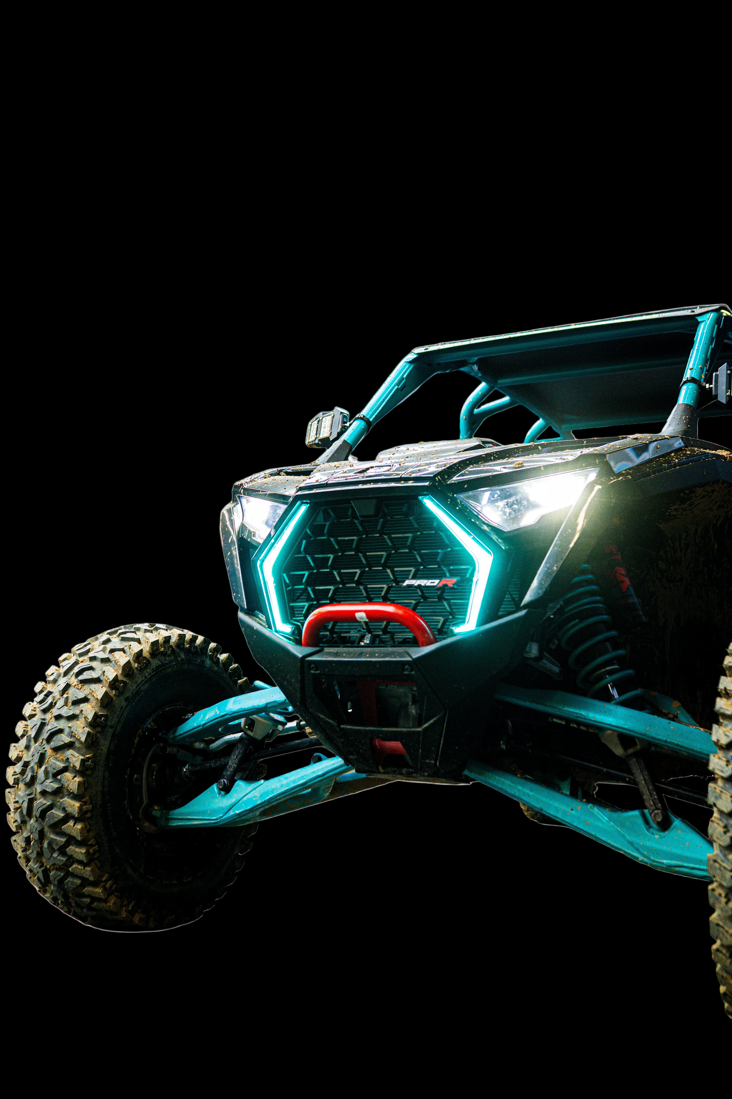 Lucky Whips RZR Pro Series RGBW Fang Lights installed on a Polaris RZR, showcasing vibrant multicolor LED lighting for off-road vehicles.