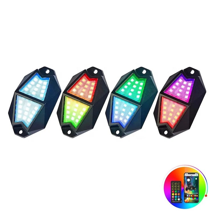 Lucky Whips Chasing Color RGB Rock Lights with four pods, vibrant multicolor LED lighting for automotive or outdoor use.