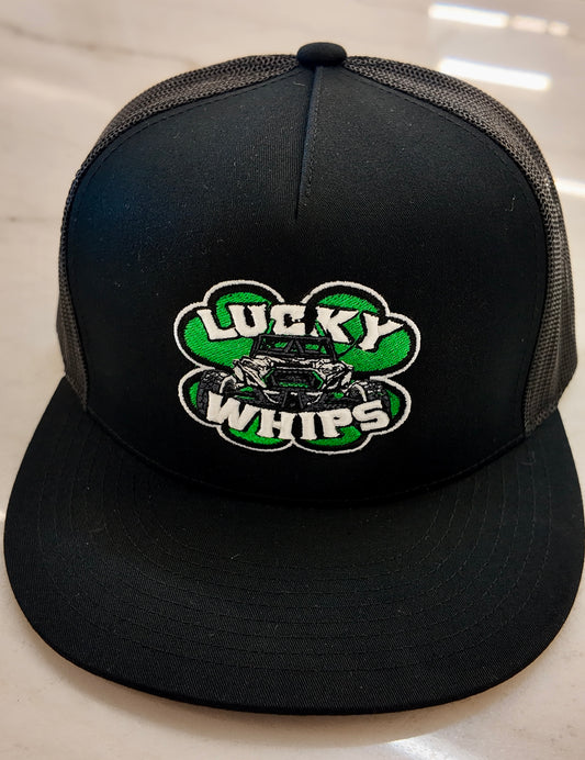 Lucky Whips trucker flat bill hat featuring a structured crown and breathable mesh back in a stylish design.
