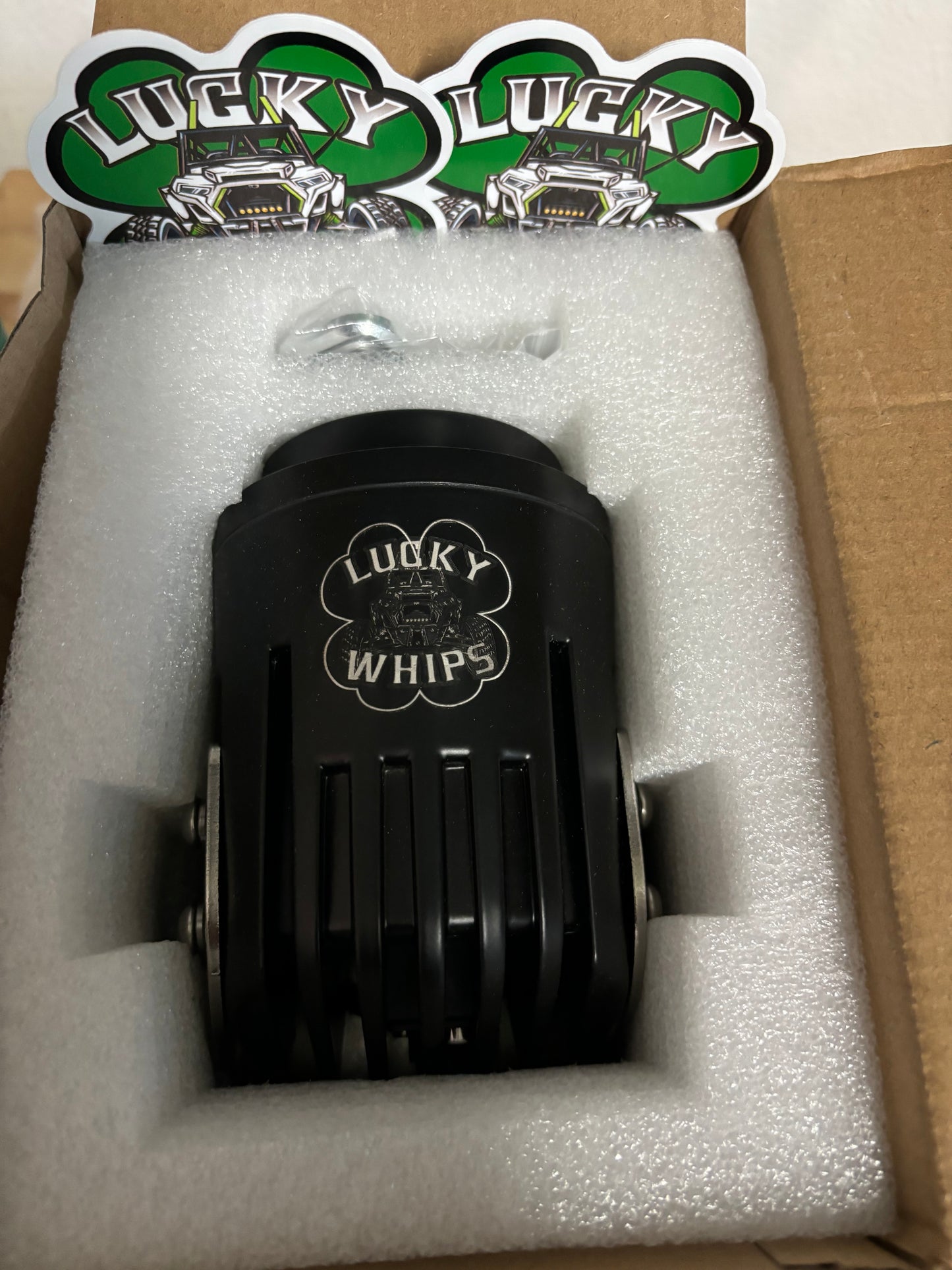 Lucky Whips Laser Pod Lights in a pair, showcasing vibrant laser effects in a dark setting.