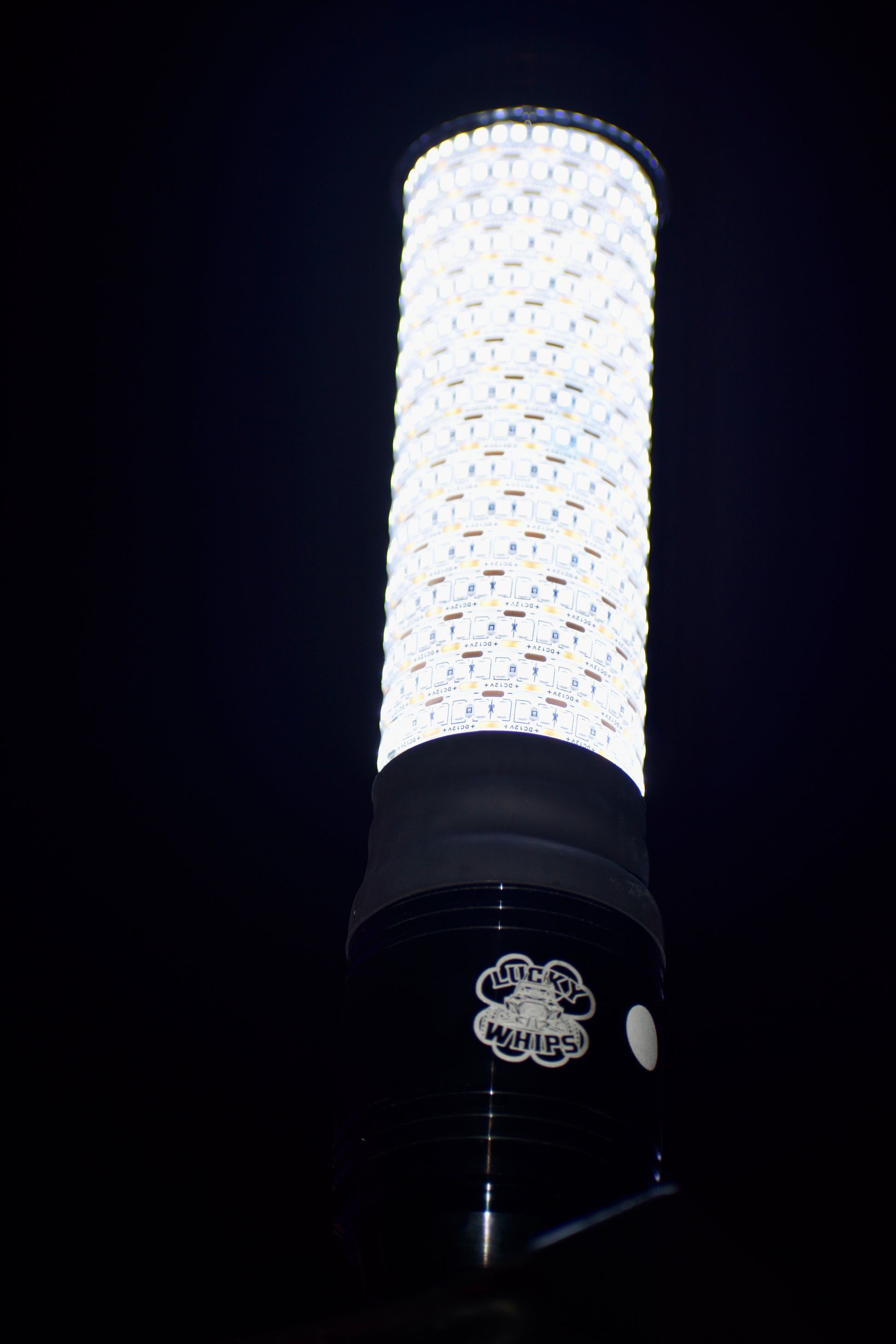 Colorful LED whips from Lucky Whips, displaying bright lights and flexible design for off-road vehicles.