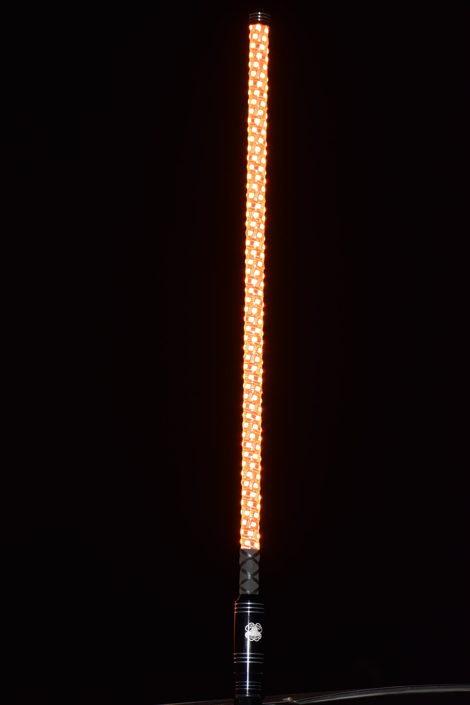 Lucky Whips OG PRO WHIPS in vibrant colors, showcasing a flexible design and ergonomic handle for optimal performance.