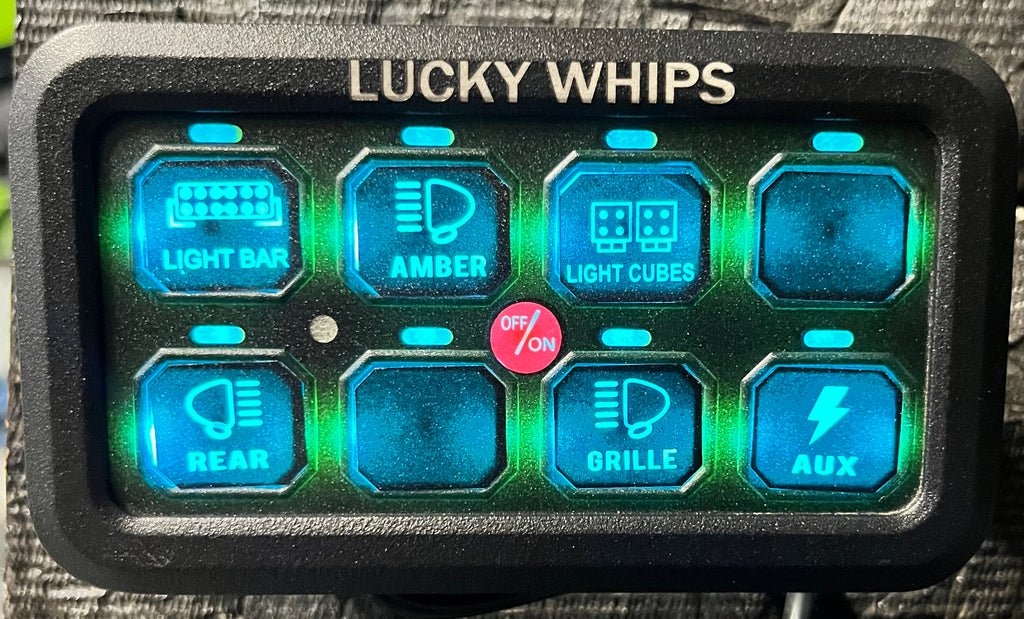 8-gang Bluetooth switch panel by Lucky Whips with multiple toggle switches on a sleek black panel.