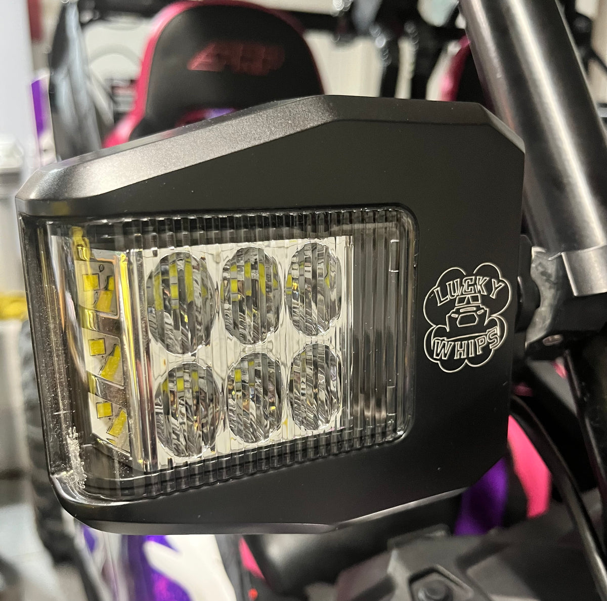 Lucky Whips UTV side view mirror featuring a sleek design and adjustable angle for optimal visibility on off-road vehicles.