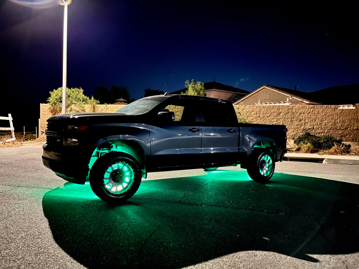 RGB wheel ring lights by Lucky Whips, featuring dual-wheel design with vibrant, colorful lighting effects for vehicles or displays.