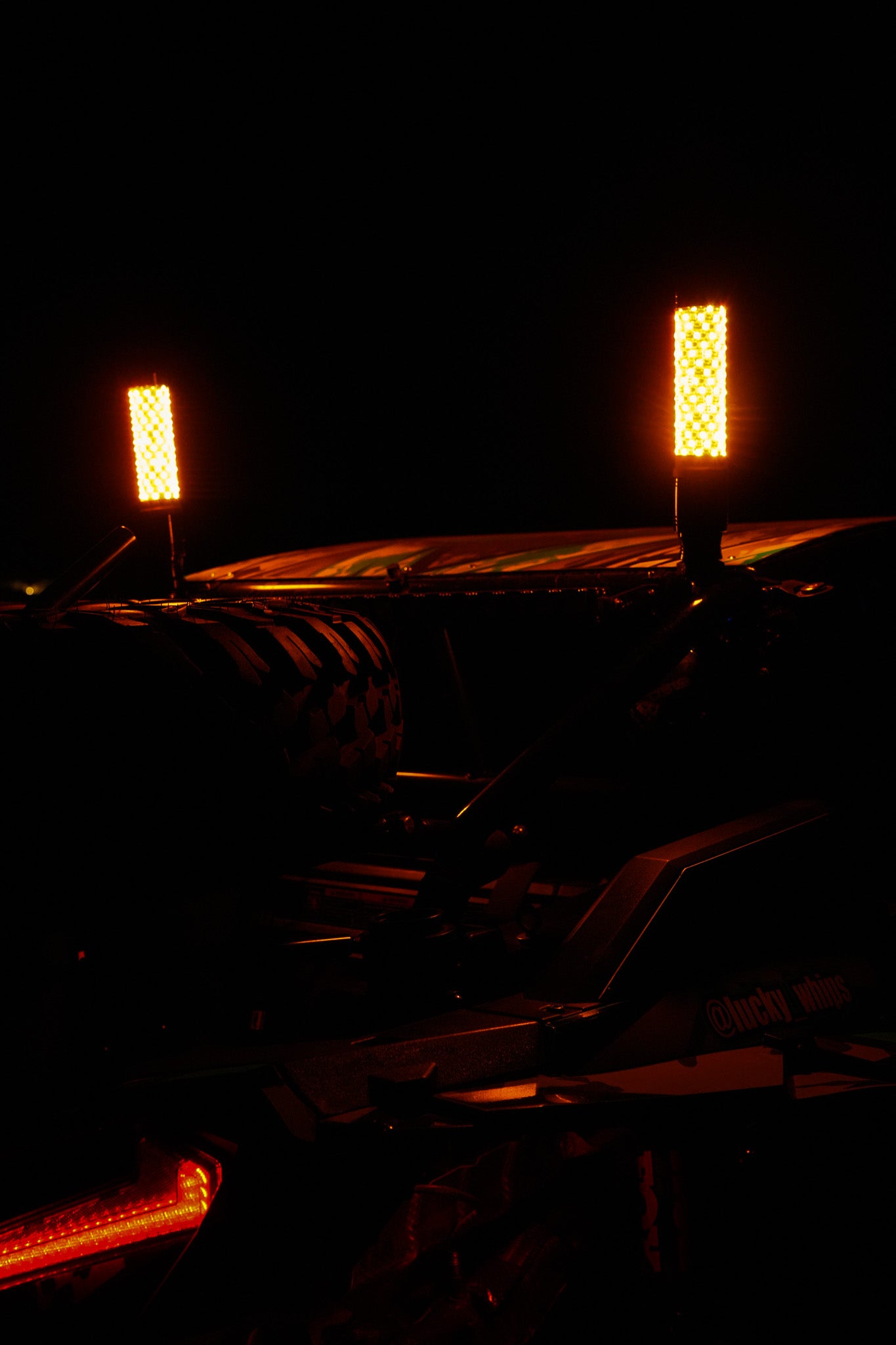 Lucky Whips XTREME 2FT FAT WHIPS in vibrant colors displayed against a neutral background.