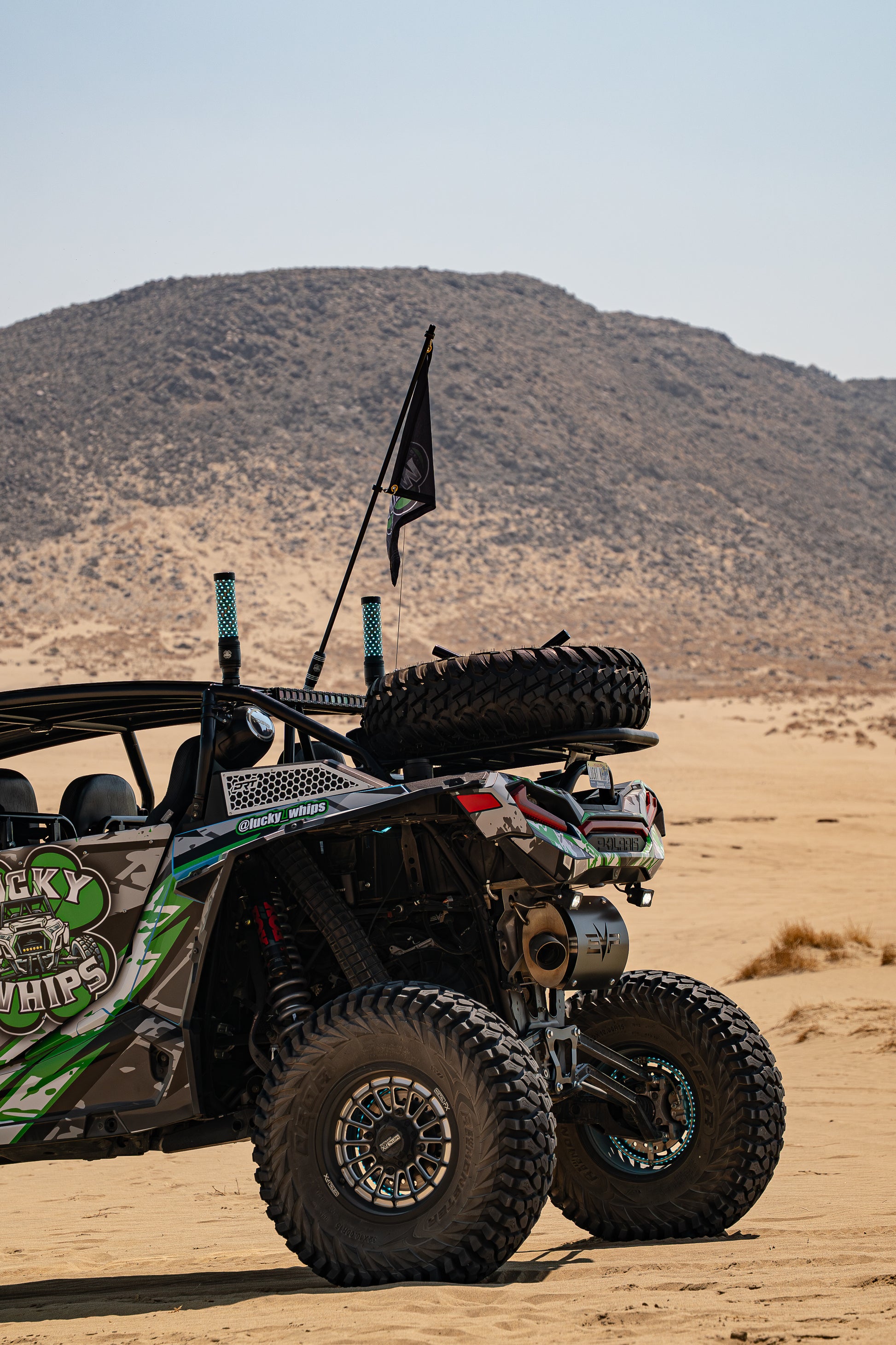 Lucky Whips XTREME 2FT FAT WHIPS in vibrant colors with a thick handle, showcasing flexible whip design.