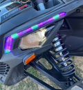 Can Am X3 RGBW Brow Lights installed on the vehicle, featuring colorful LED lighting for enhanced visibility and style.