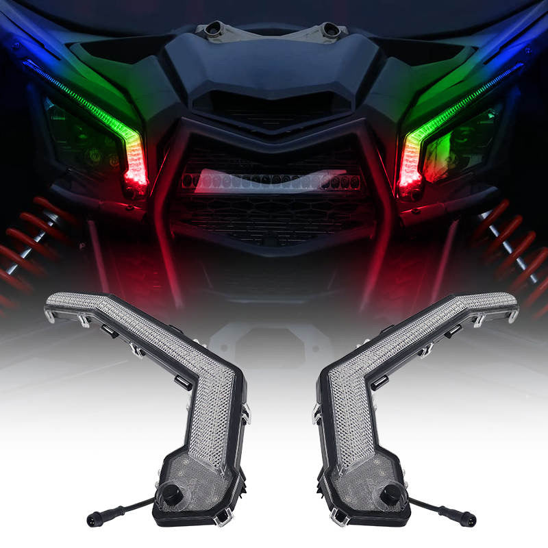 Can Am X3 RGBW Brow Lights installed on side of Can Am X3 off-road vehicle, showcasing colorful LED lighting for enhanced visibility.