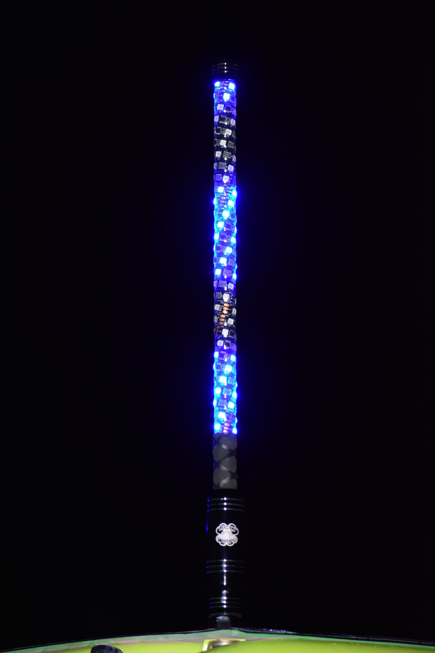 Colorful 2FT LED whips by OG WHIPS, showcasing vibrant lights and flexible design for outdoor adventures.