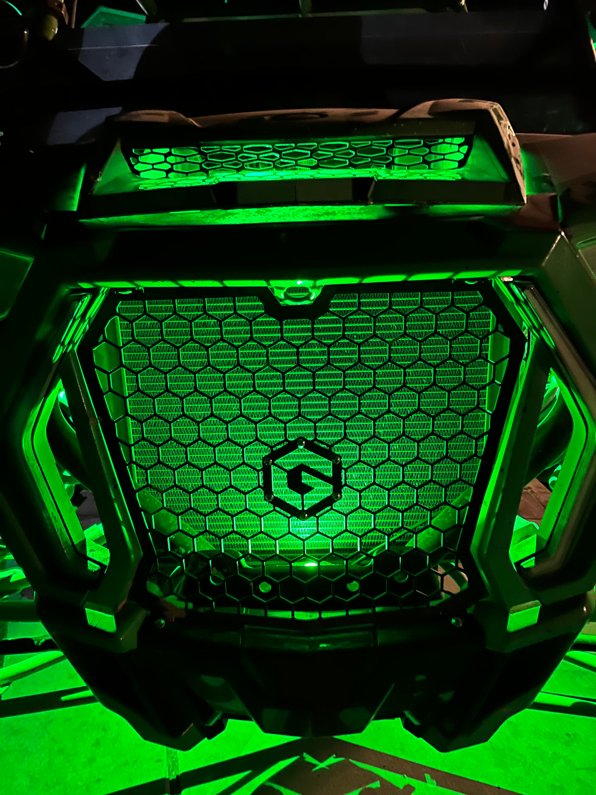 RGB LED Rock Light Kit with four colorful rock lights, perfect for vehicle underglow and outdoor decorative lighting.